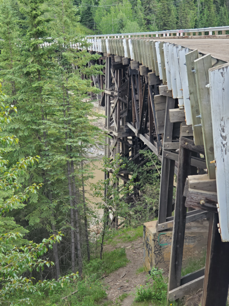 The 1942 curved wooden trestle bridge along an early alignment of the Alaska Highway