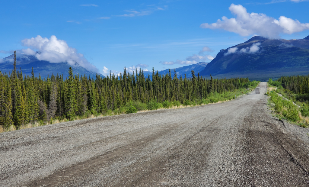Severely frost-damaged sections of highways in the Yukon are often temporarily graveled over.