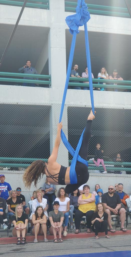 Acrobat on a suspended sash.