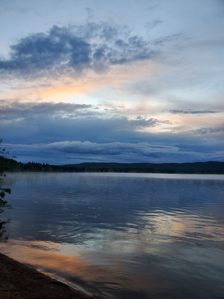 Sunset at midnight over Birch Lake, Alaska