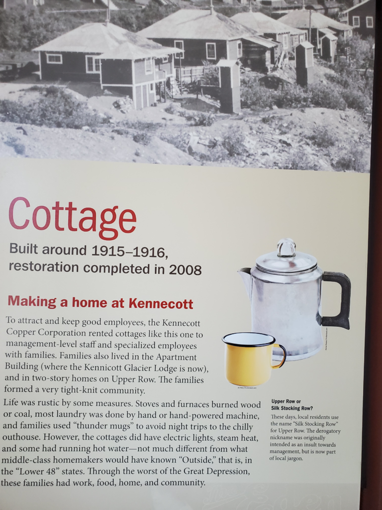 Interpretive sign describing family housing in the Kennicott mining camp.