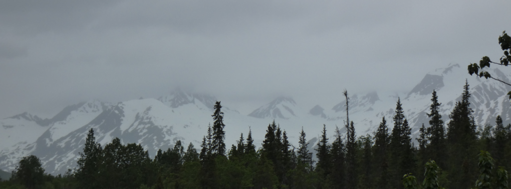 Highway to Valdez surrounded by snowy Chugach Mountains -- in late June.