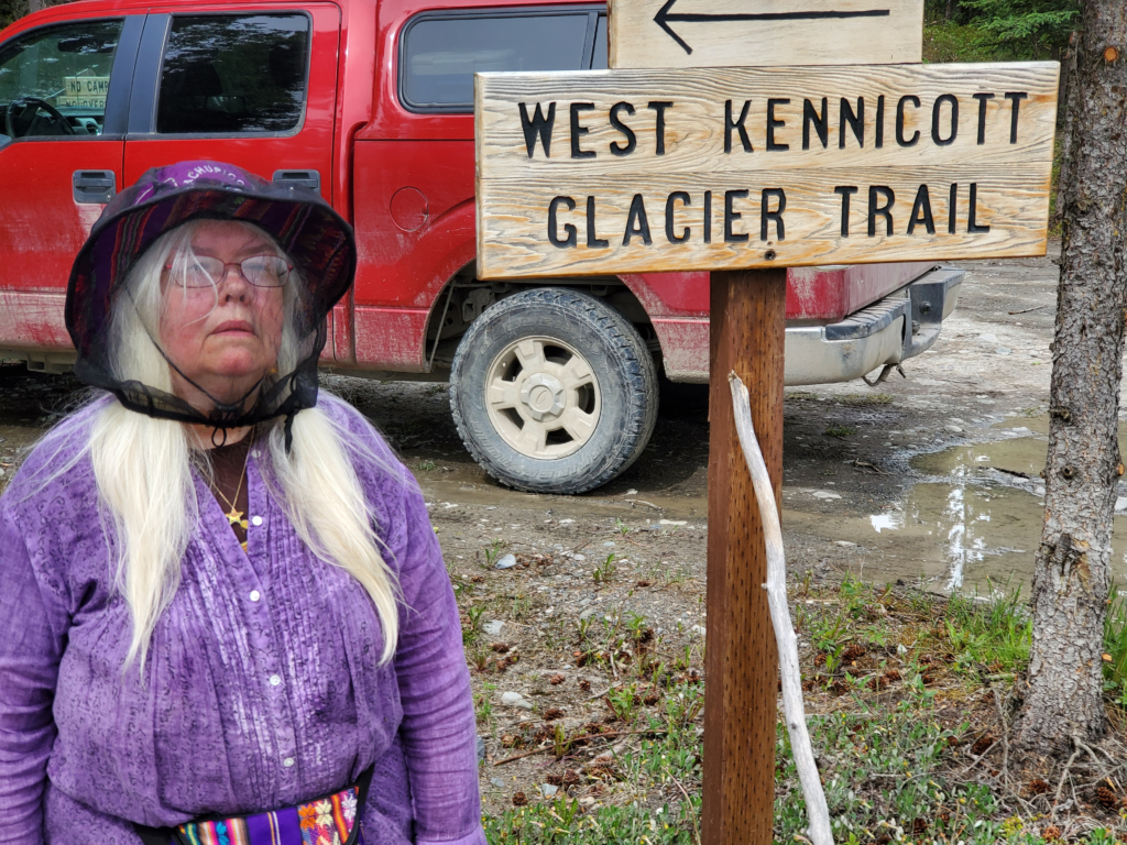 Susan at trailhead, girded for mosquito attack.