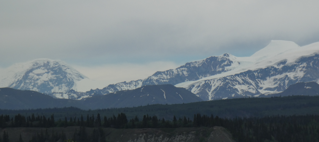 Clouds lift enough to give us a pretty decent view of the high Wrangell volcanoes.