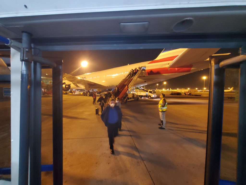 Passengers deplaning at Barcelona airport.