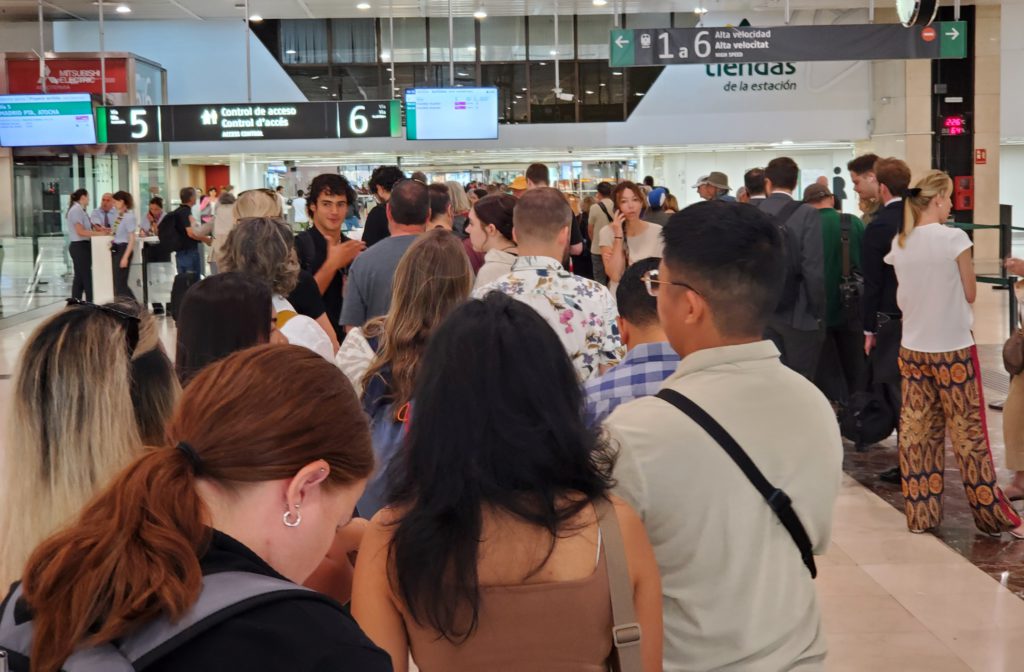 Traveling to Girona, view of the annoyingly slow airport level security line at the high speed train.