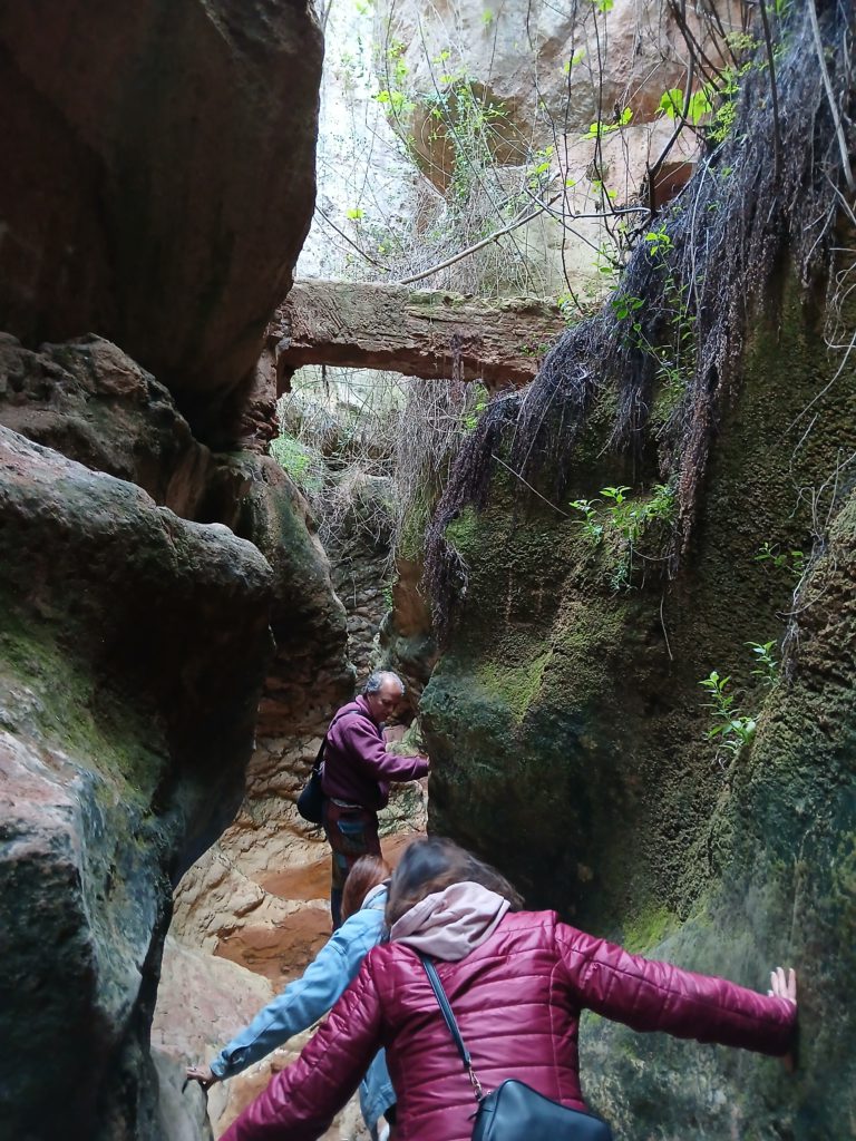 Slot canyon with abandoned aqueduct above