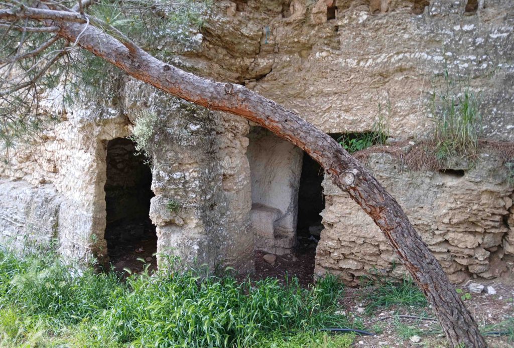 Near the top. Caves hewn into the rock. Perhaps they were living quarters at some point.