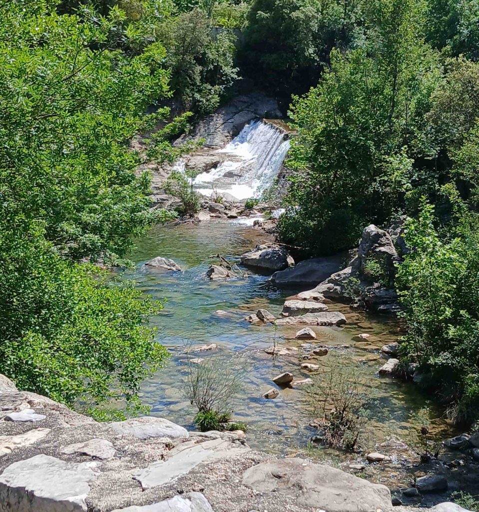 A waterfall at the start of the river promenade