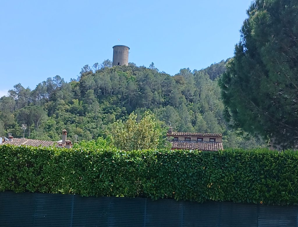 The so-called Roman tower seen from the village