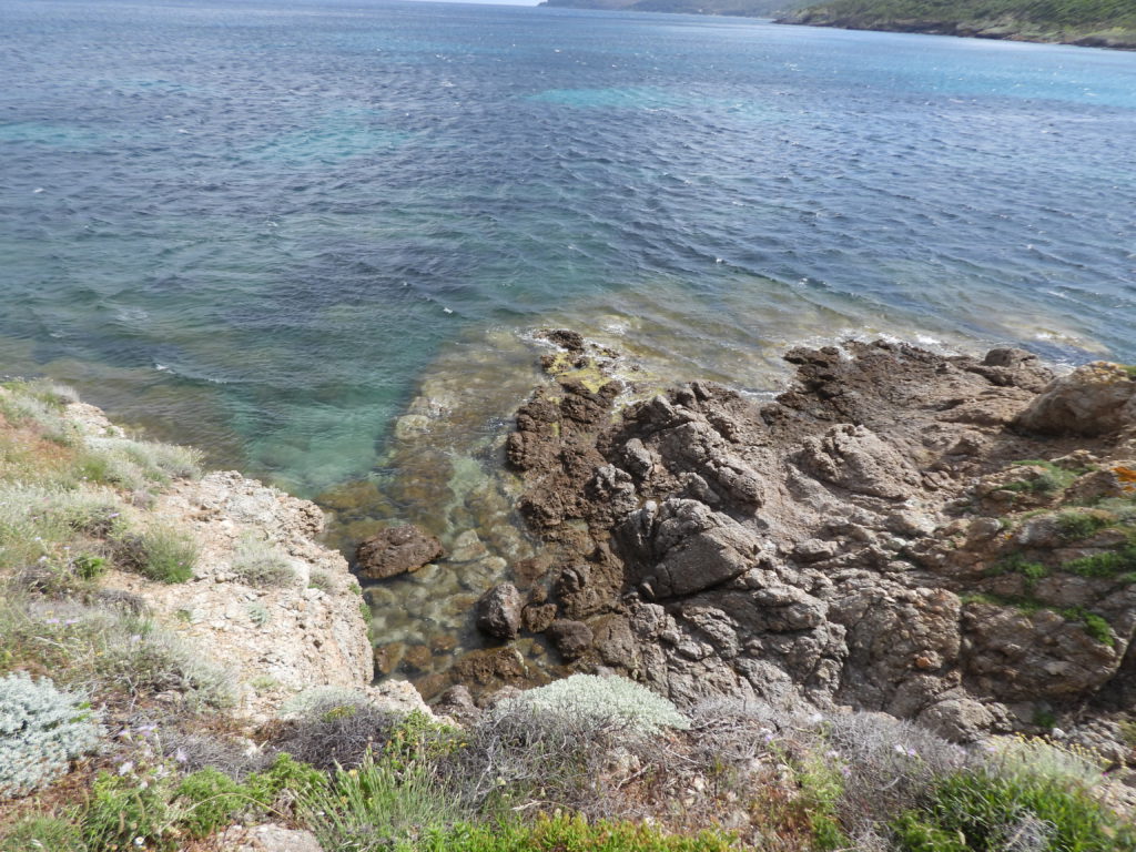 Multicolored Mediterranean Sea water in Rogalino Cove.